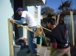 Carl, Jimbo and Steve (from Rebuilding Together) working on back door
